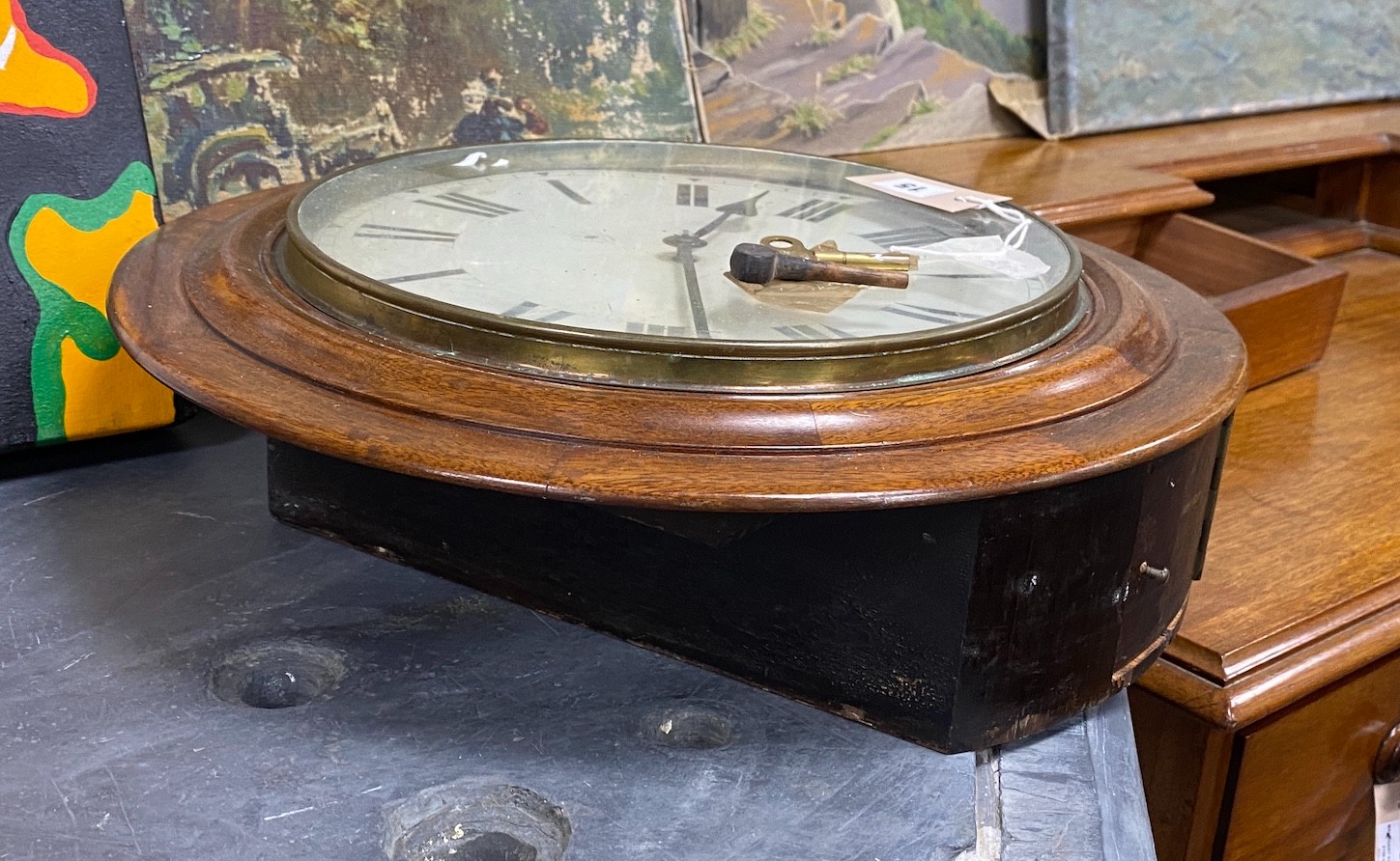 An early 20th century circular mahogany wall dial, diameter 43cm